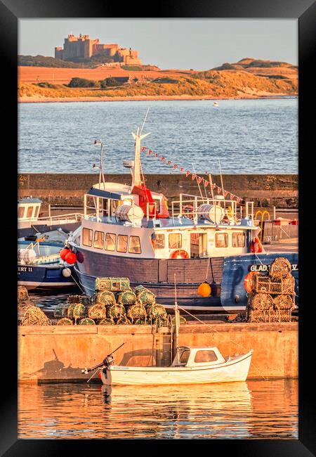 Majestic Bamburgh Castle at Sunrise Framed Print by Tim Hill