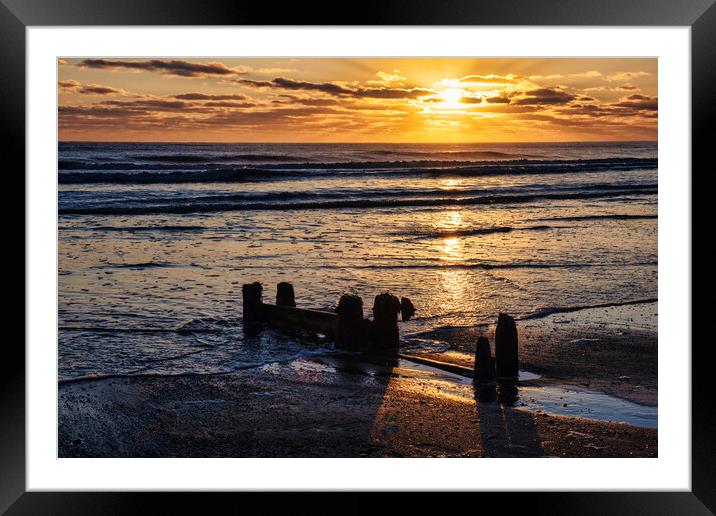 Golden rays over tranquil Sandsend Framed Mounted Print by Tim Hill