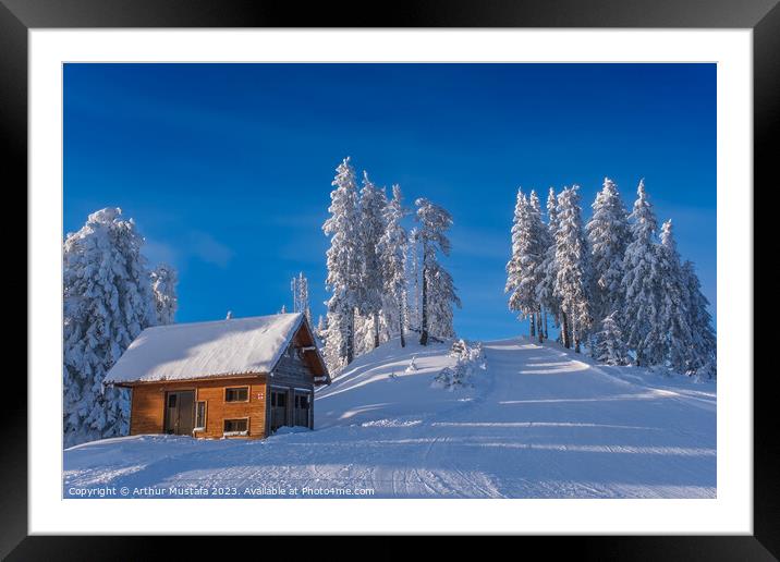 Winter wonderland in the Alps, frozen spruce trees and a cottage Framed Mounted Print by Arthur Mustafa