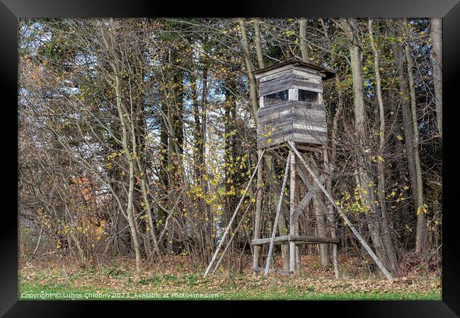 Wooden lookout tower for hunting in the woods and on meadow Framed Print by Lubos Chlubny