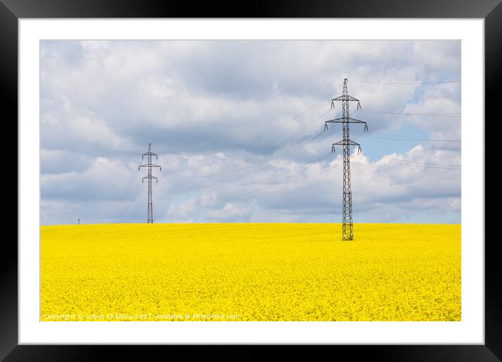 High voltage power lines above rapeseed field (Brassica napus). Plant for vegetable oil, green energy and biodiesel. Framed Mounted Print by Lubos Chlubny