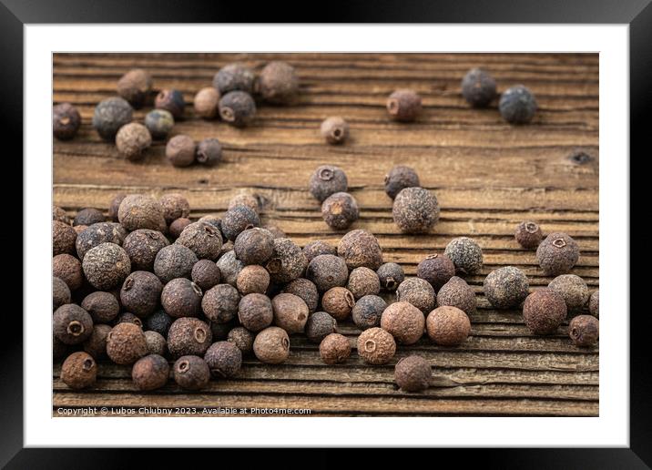 Allspice spice on wooden table Framed Mounted Print by Lubos Chlubny