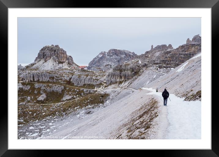 Tourist at Tre Cime di Lavaredo track on winter season. National Park Tre Cime di Lavaredo, Dolomite Alps mountains, Trentino Alto Adige region, Dolomites, Italy Framed Mounted Print by Lubos Chlubny