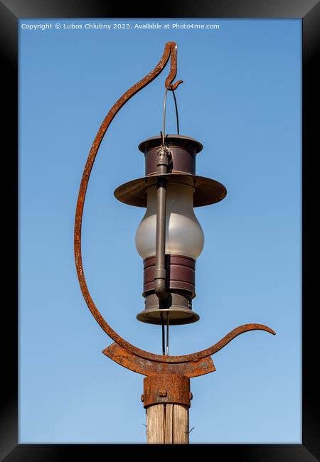 Outdoor lighting in the shape of a kerosene lamp Framed Print by Lubos Chlubny