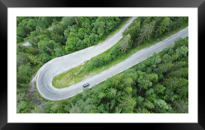 Aerial view of a winding road and forest in Norway. Picturesque mountain road Framed Mounted Print by Irena Chlubna