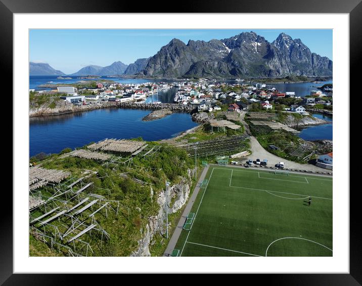 Aerial view of fishing village and football field on Lofoten Islands in Norway Framed Mounted Print by Irena Chlubna