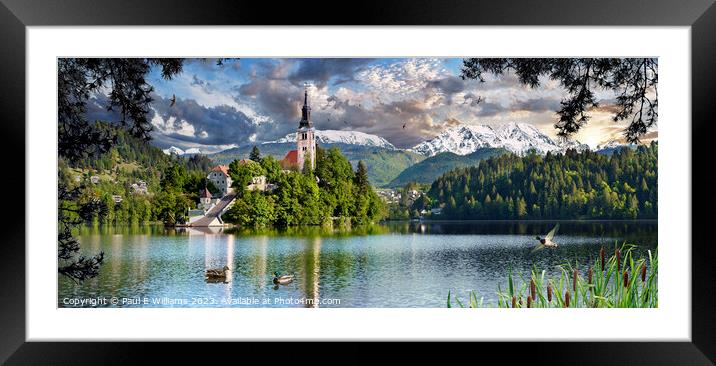The Picturesque Island Church in Lake Bled with Alpine peaks beh Framed Mounted Print by Paul E Williams
