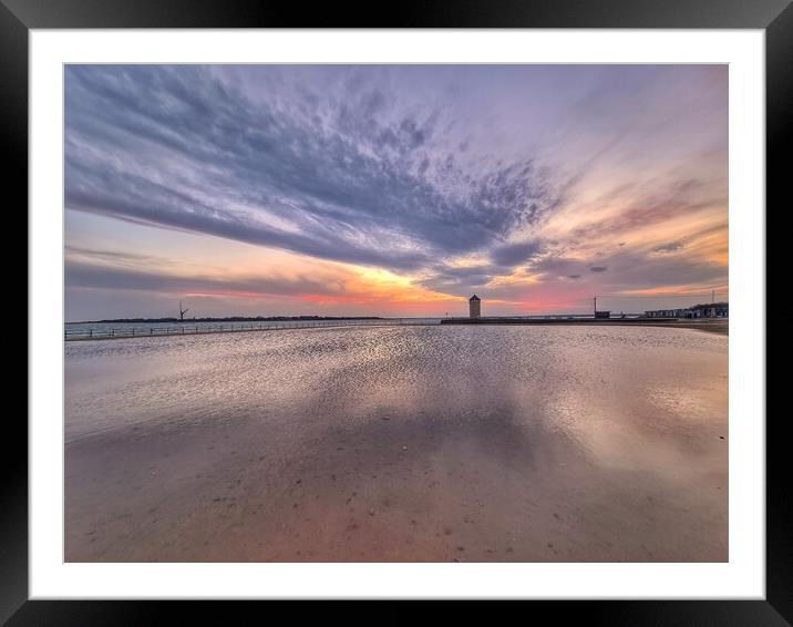 Sunset cloudscape and colours over the Brightlingsea tidal pool and Batemans Tower.  Framed Mounted Print by Tony lopez