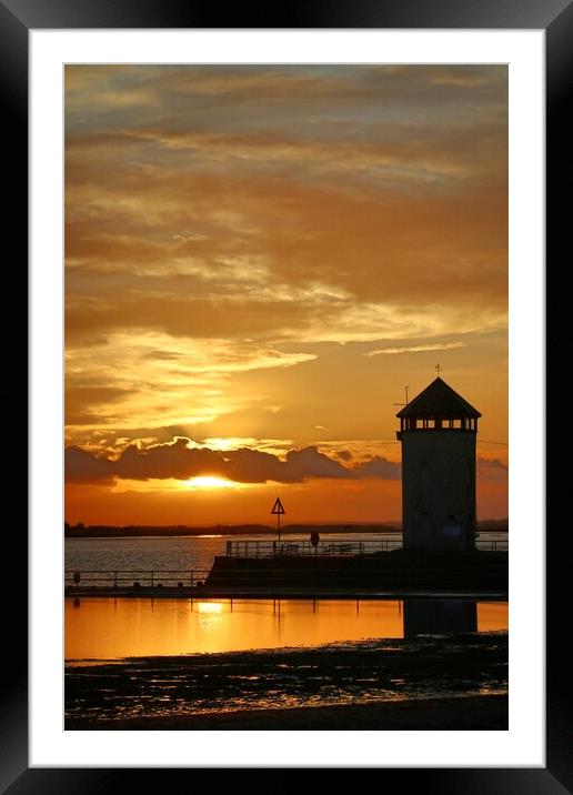 Sunset over the Batemans Tower in Brightlingsea essex at sunset  Framed Mounted Print by Tony lopez