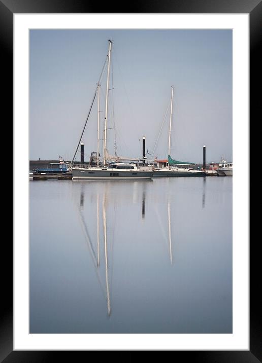 Morning calm over Brightlingsea Harbour with great reflections  Framed Mounted Print by Tony lopez