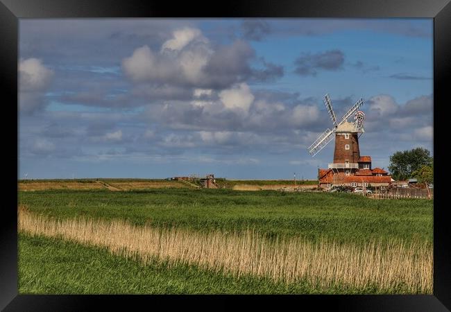 Cley windmill in norfolk basking in the afternoon sun  Framed Print by Tony lopez