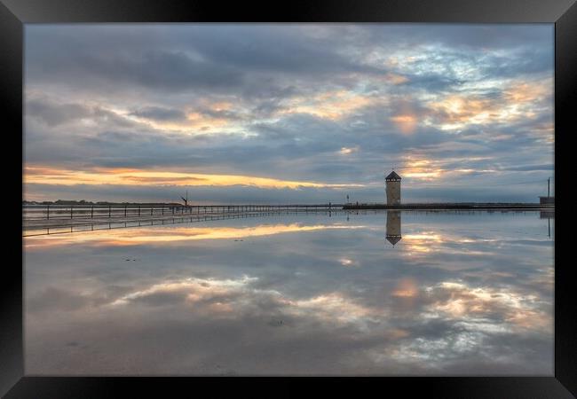 Cloudscape reflections over Batemans Tower Brightlingsea.  Framed Print by Tony lopez
