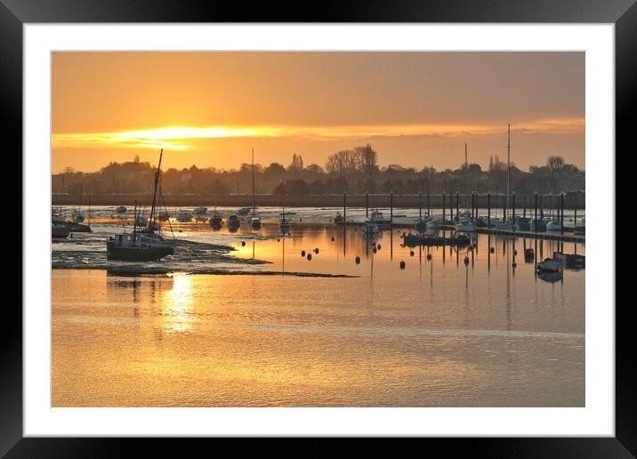Sun rising over Brightlingsea Harbour  Framed Mounted Print by Tony lopez