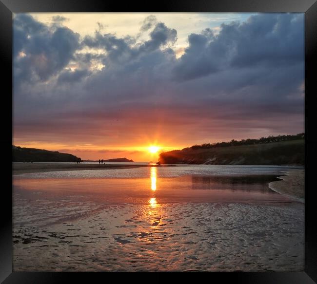 Sunset colours over Porth beach Cornwall  Framed Print by Tony lopez