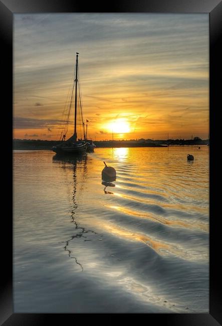 Sunrise colours and reflections over Brightlingsea Harbour in Essex  Framed Print by Tony lopez