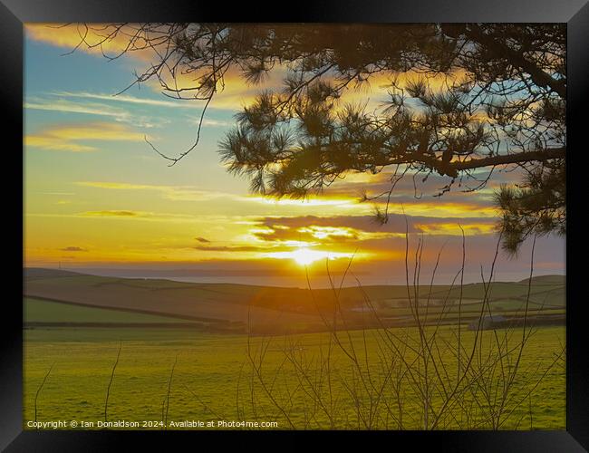 Devon Sunset Framed Print by Ian Donaldson