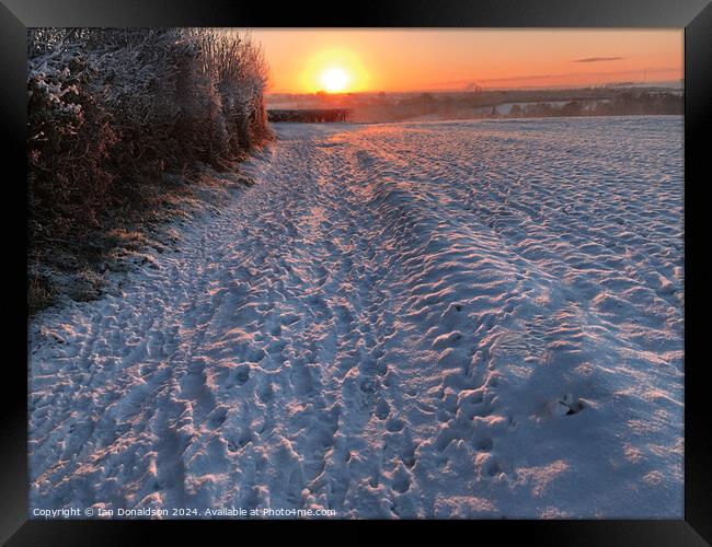 Snowy Sunrise Framed Print by Ian Donaldson