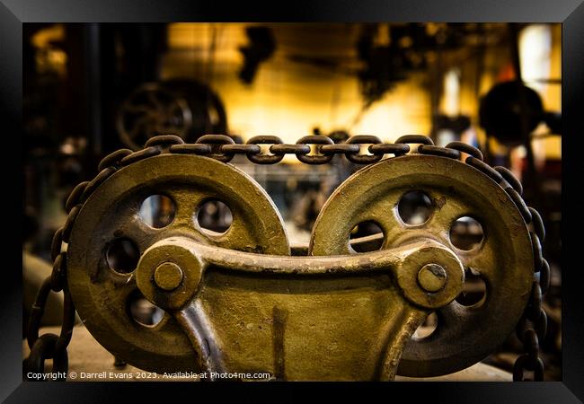 Wheels and Chain Framed Print by Darrell Evans