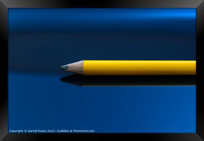 Yellow pencil on a blue background Framed Print by Darrell Evans
