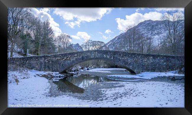 Grange bridge in snow Framed Print by Darrell Evans