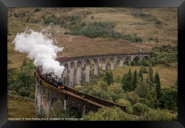 TheJacobite crossing Glenfinnan Viaduct Framed Print by Pete Mainey