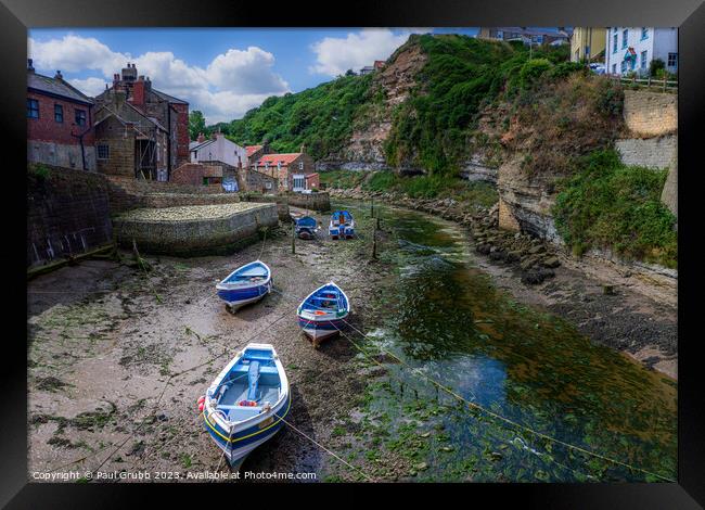 Staithes Harbour at low tide Framed Print by Paul Grubb