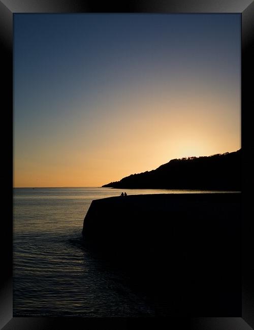 Lyme Regis sunset Framed Print by Charles Powell