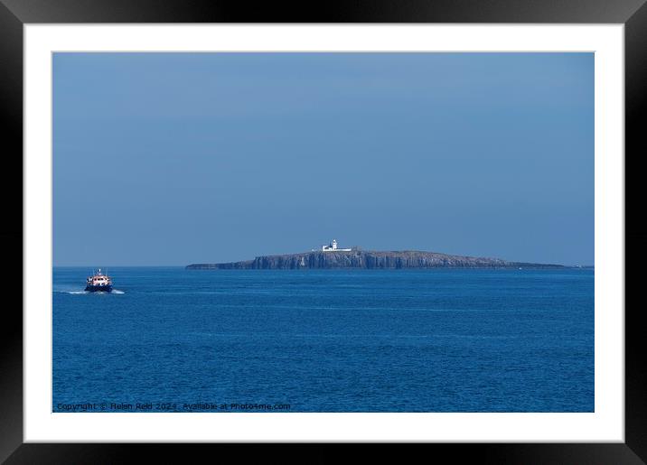 Northhumberland Farne lighthouse with a passenger boat Framed Mounted Print by Helen Reid
