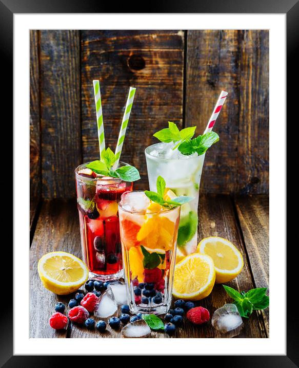 Fruit drinks on wooden background Framed Mounted Print by CC Designs