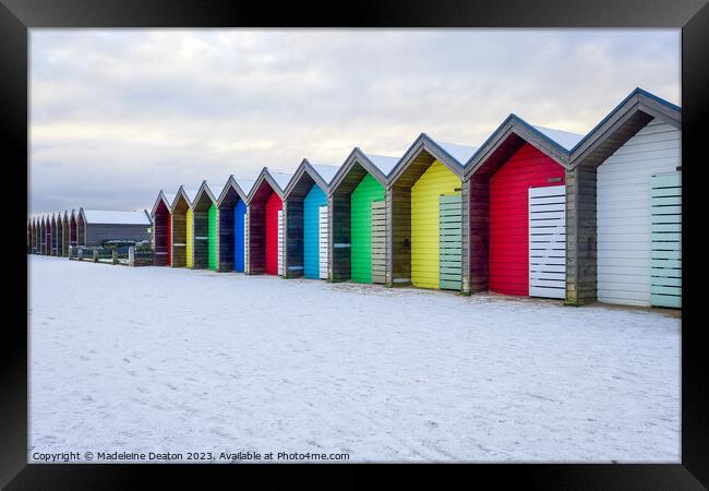 Beach Huts in the Snow Framed Print by Madeleine Deaton