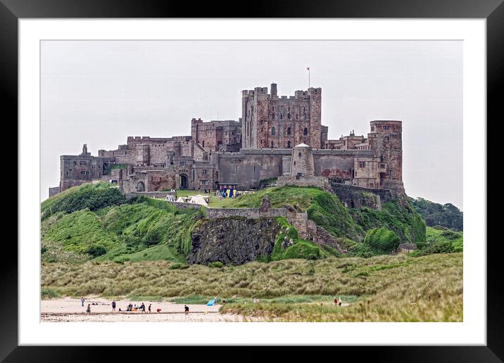 Bamburgh Castle: Beachside Historic Majesty Framed Mounted Print by Paul Telford