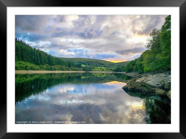 sunset reflections on water  Framed Mounted Print by Jonny Angle