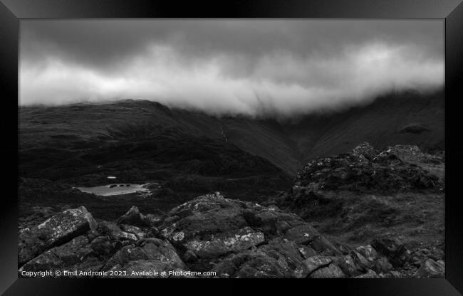 Moody weather in the Cumbrian Mountains Framed Print by Emil Andronic
