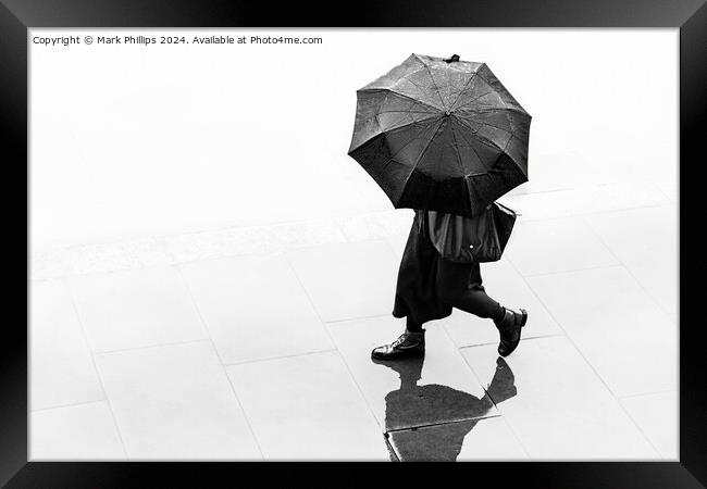 Figure with umbrella Framed Print by Mark Phillips