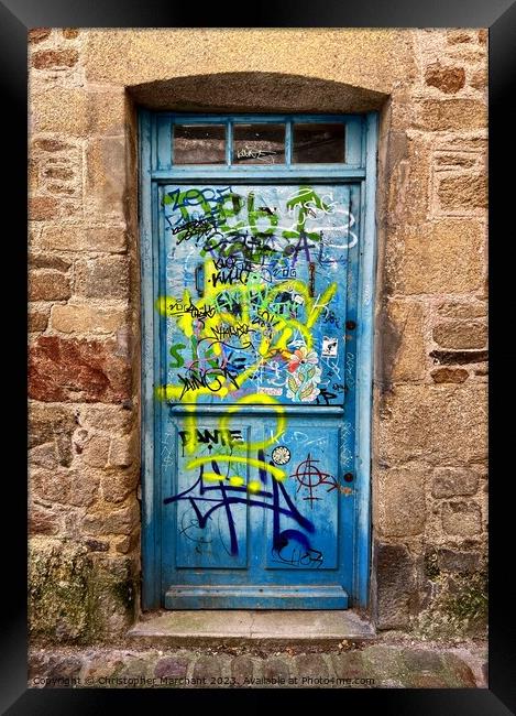 Graffitied door  Framed Print by Christopher Marchant