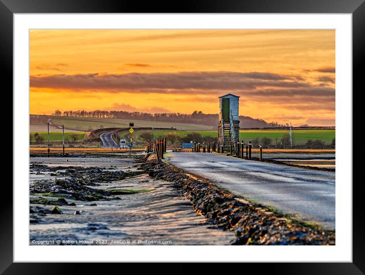 The Lindisfarne Causeway at dusk Framed Mounted Print by Robert Mowat