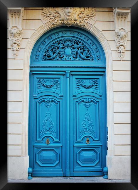 Old fashioned front door entrance, white facade and blue door, Paris, France Framed Print by Virginija Vaidakaviciene