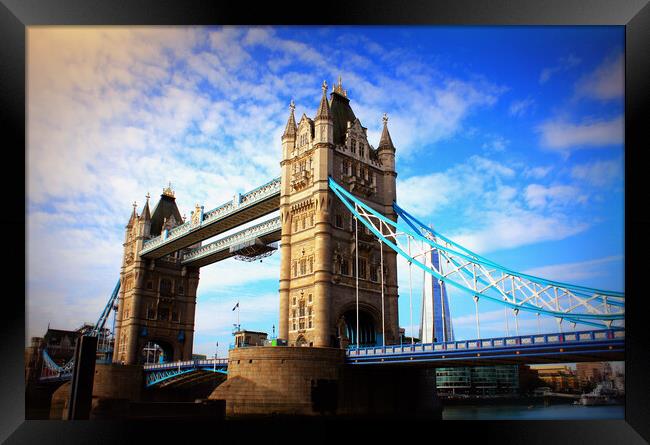 Tower Bridge in London, the UK. Sunset with beautiful clouds. Drawbridge opening. One of English symbols Framed Print by Virginija Vaidakaviciene