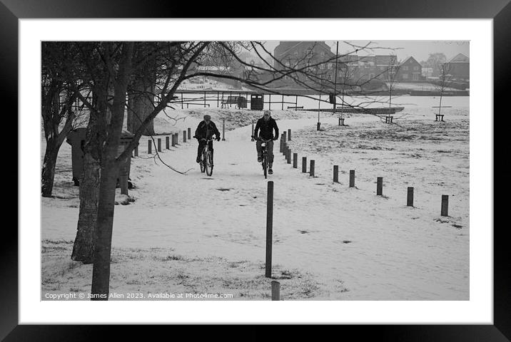 Bike Riding in the Snow  Framed Mounted Print by James Allen
