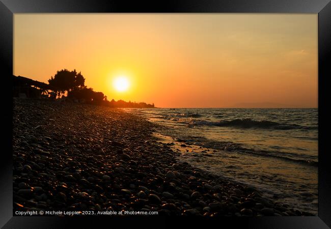 Rhodes Beach Sunset and Pebbles Framed Print by Michele Leppier