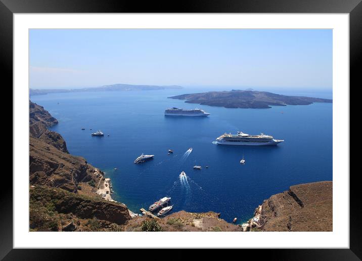 Cruise ships in Thira, Santorini island, Greece Framed Mounted Print by Olga Peddi