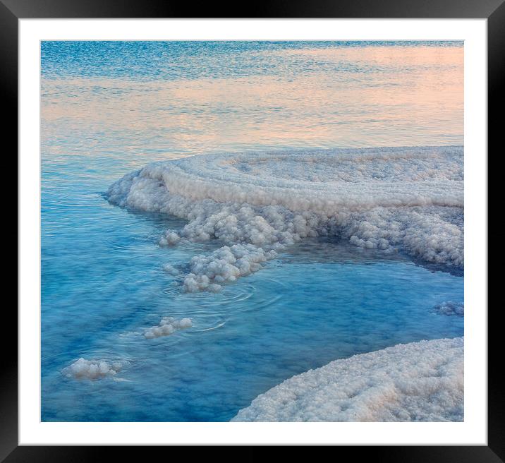 Salt deposits, typical landscape of the Dead Sea,  Framed Mounted Print by Olga Peddi
