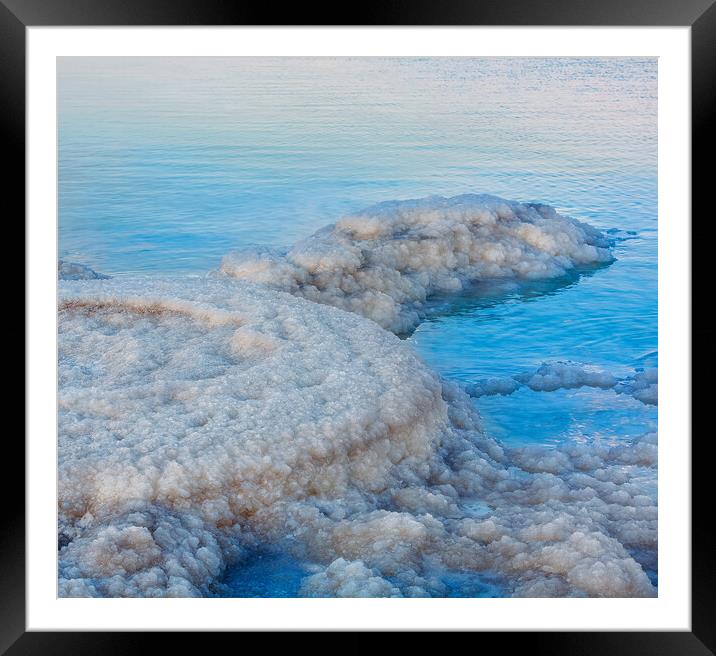 Salt deposits, typical landscape of the Dead Sea,  Framed Mounted Print by Olga Peddi