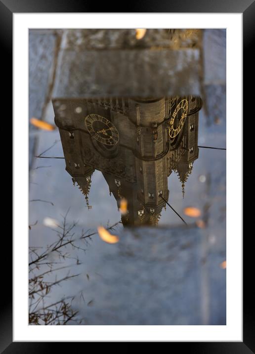 Reflection of the highest part of the clock tower. Framed Mounted Print by Olga Peddi