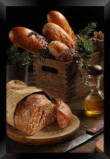 Rustic handmade bread  Framed Print by Olga Peddi