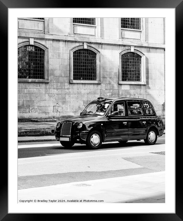 Iconic Black London Taxi in Black and White Framed Mounted Print by Bradley Taylor