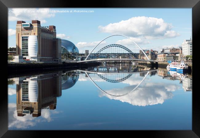 Bridges reflected in the river Tyne  Framed Print by Bryan Attewell