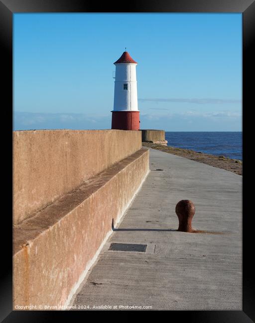 Berwick pier and lighthouse Framed Print by Bryan Attewell