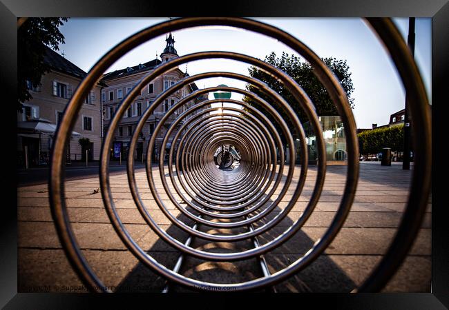 Hypnotized by simple bike rack Framed Print by Suppakij Vorasriherun