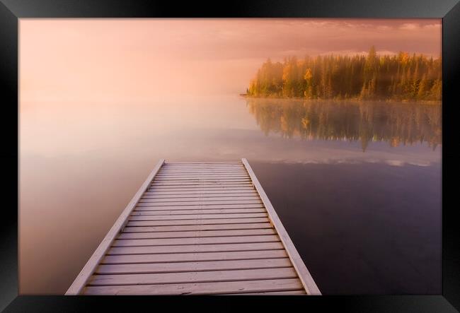 Frosted Dock on a Lake Framed Print by Dave Reede